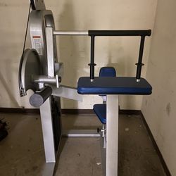 Power strength tricep extension and side lateral raise machines