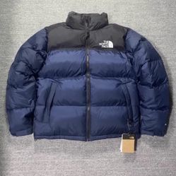 The North Face blue puffer jacket 