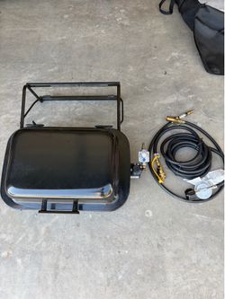 RVQ BBQ grill for mounting on outside of rv