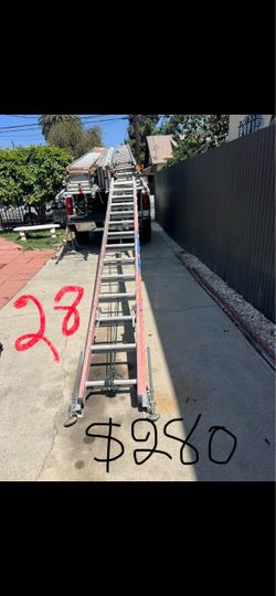 Excellent condition, 28 feet and more sizes available fiberglass extension ladders