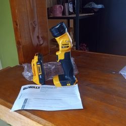 DeWalt.  20 v. New.  LED.  Flash light.    W/ battery.  2.0 AH