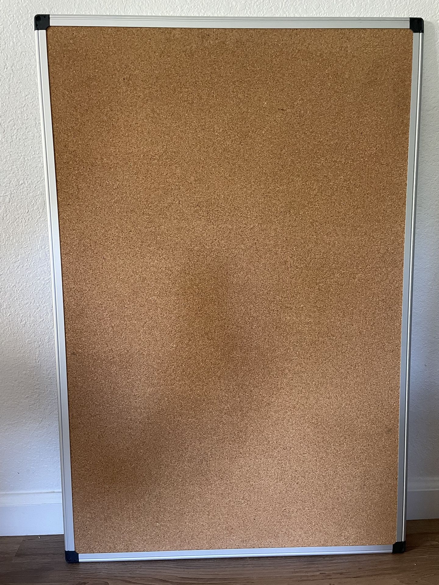 Cork board 24" x 36" with mounting hardware included