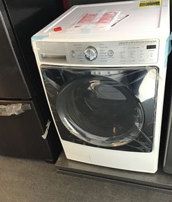 New scratch and dent kenmore front load washer. 1 year warranty