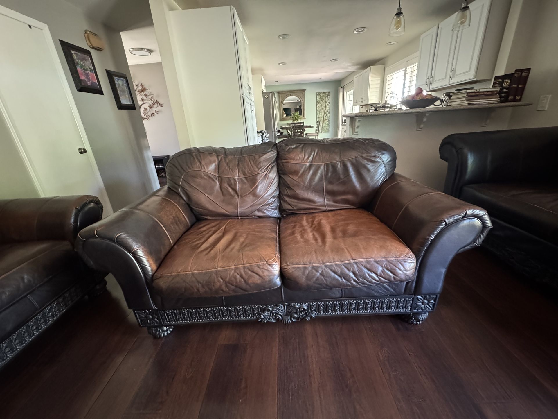 Ashley Britannia Rose Brown Genuine Leather Solid Wood Black Loveseat