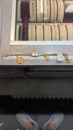 18k Gold Charm Bracelet with Multiple Pendants