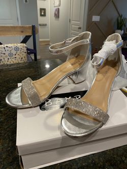 Brand new silver heels