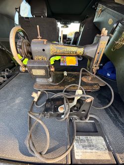 Vintage white rotary sewing machine