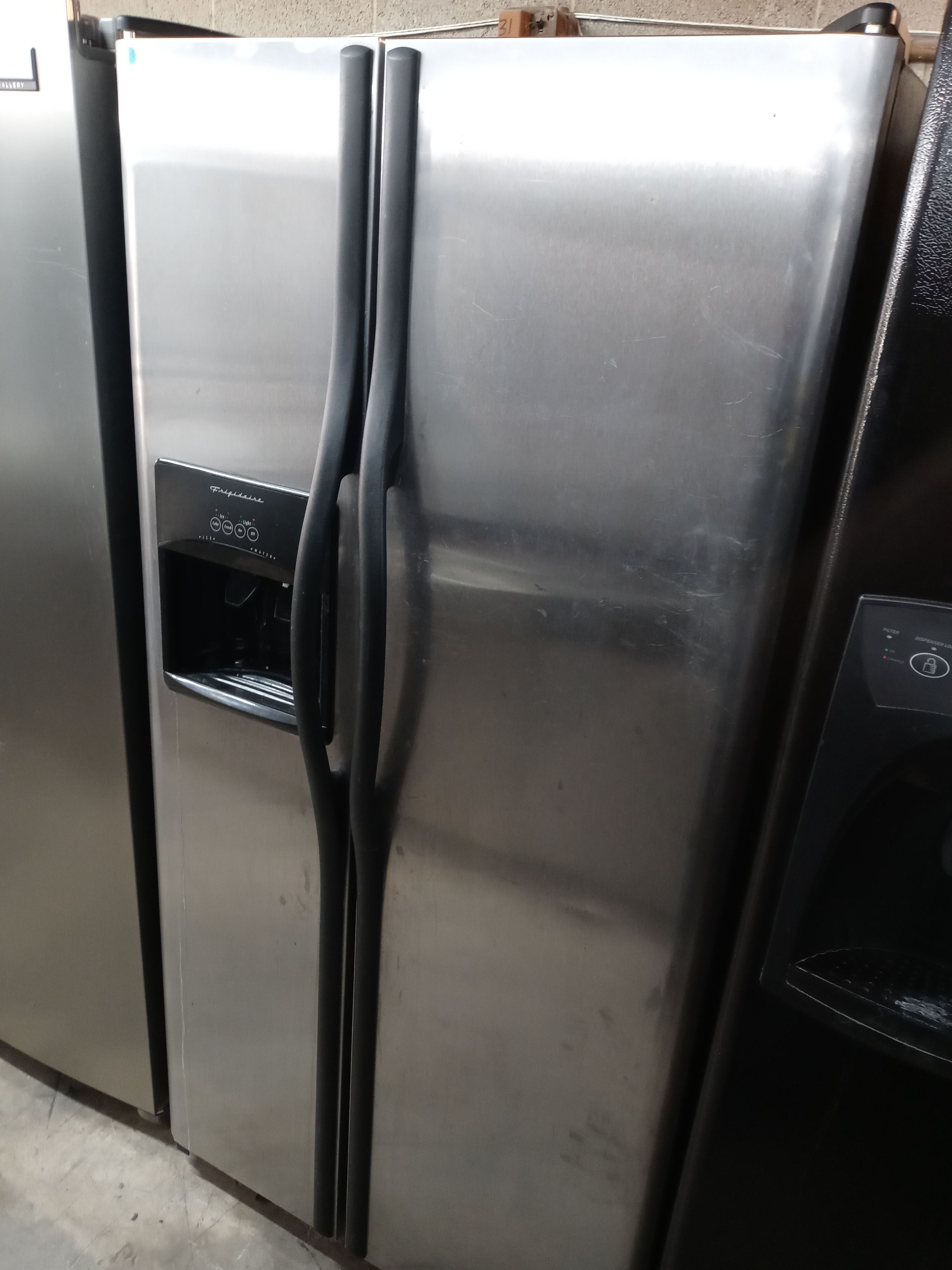 Frigidaire stainless steel side by side refrigerator (no freezer drawer) - Free delivery