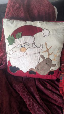 All 4 Pieces One (1)  Christmas  pillows &  two (2) Christmas throw blanket And Container See Picture #12 All 4 Pieces For Only $30