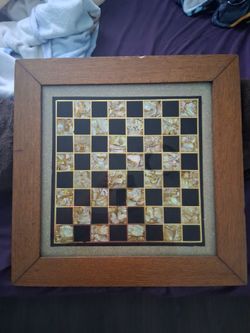 Antique heavy wooden checkerboard