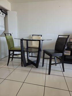 Glass Top Counter Height Table.. + 4 Chairs...