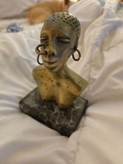 Amazing mid-century bronze bust on marble of a African woman with earrings and a nose ring
