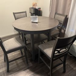WRENNING COUNTER HEIGHT DINING TABLE AND 4 CHAIRS