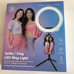 Ring light with phone stand