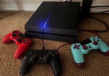 Sony PlayStation 4 Console with 3 Controllers