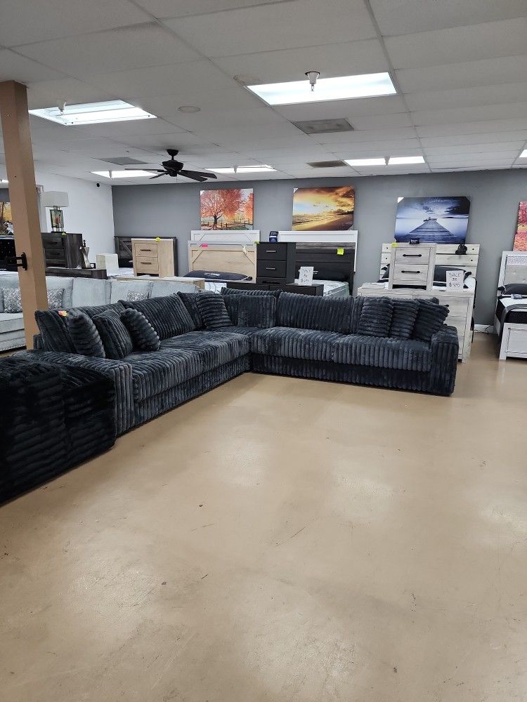 Huge 128 by 128 DARK GREY SECTIONAL WITH VIRAL FABRIC