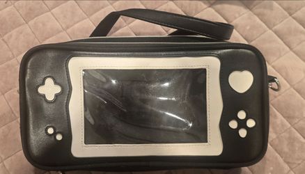 This is a GeekShare "Play Game" crossbody bag designed as a portable carrying case for the Nintendo Switch