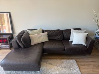 Brown leather sectional couch
