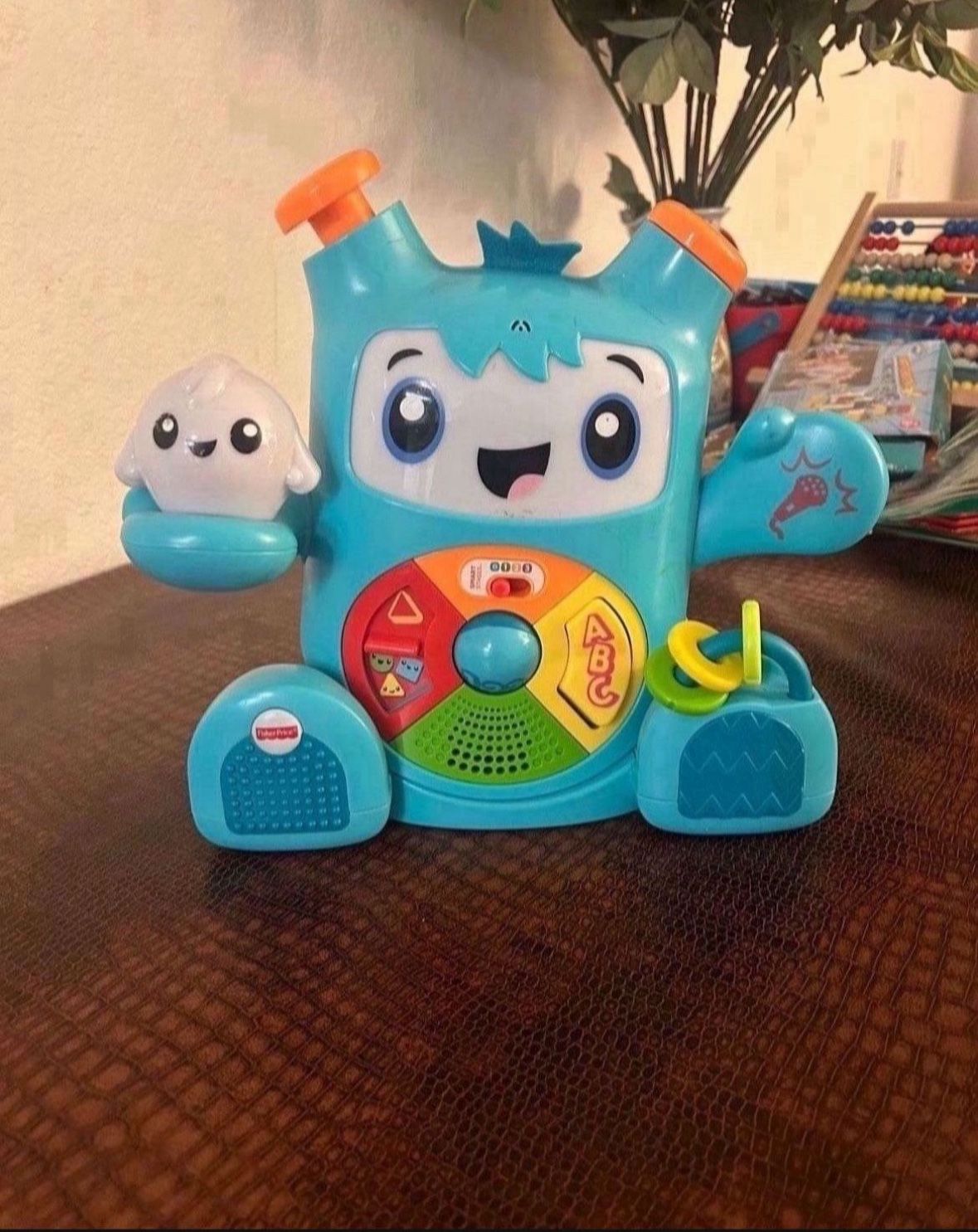 Fisher-Price Dance & Groove Rockit interactive musical toy with Smart Stages learning content for babies and toddlers