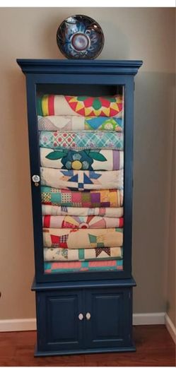 Gun cabinet 2024 quilt display