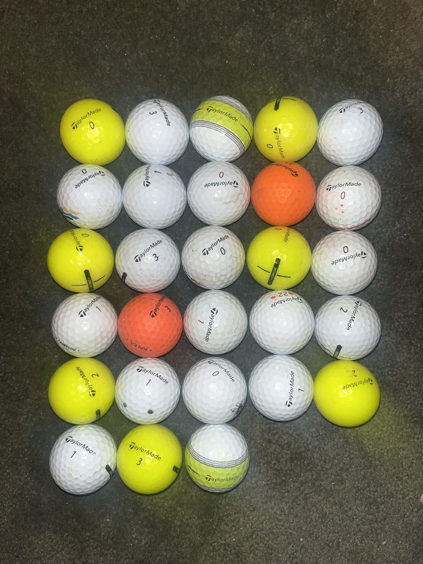 28 Taylormade Golf Balls.