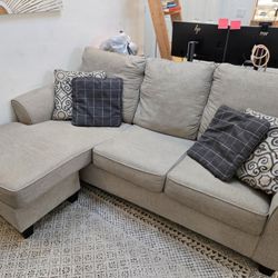 Light Gray Couch With Chase & Decorative Pillows 