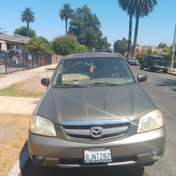 2002 Mazda Tribute Es Fully Loaded Power Windows, Sunroof,  Leather Interior, Alloy Rims, Clean Title .