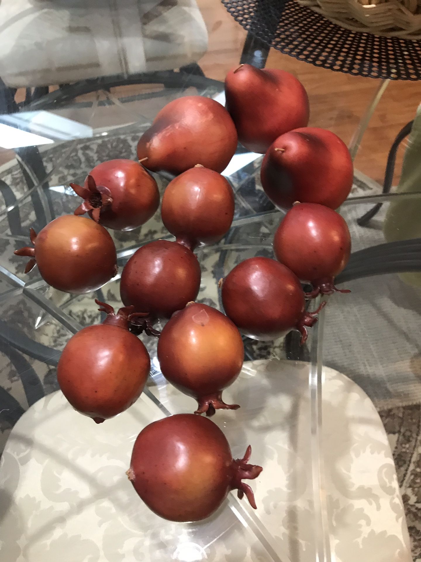 Very life like artificial pears and pomegranates