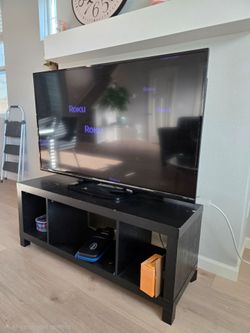 55 inch sharp tv with roku and console table