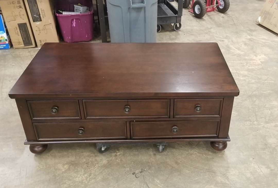 Signature Design by Ashley Porter Rectangular Cocktail Table, 28"L x 52"W x 19"H $245 FIRM