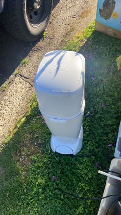 Diaper dumper pick up. E.   Side.  Tacoma