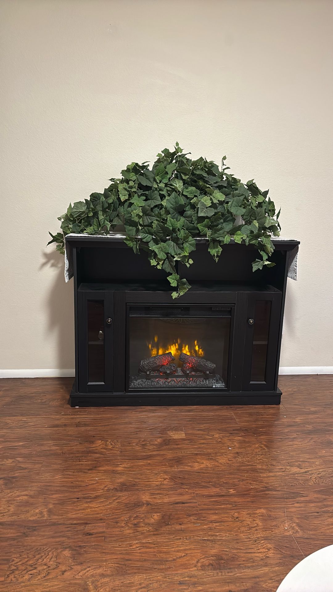 Artificial Greenery In A Wicker Basket