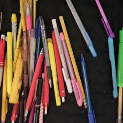 Random Assortment Of Pens Pencils Markers And Highlighters