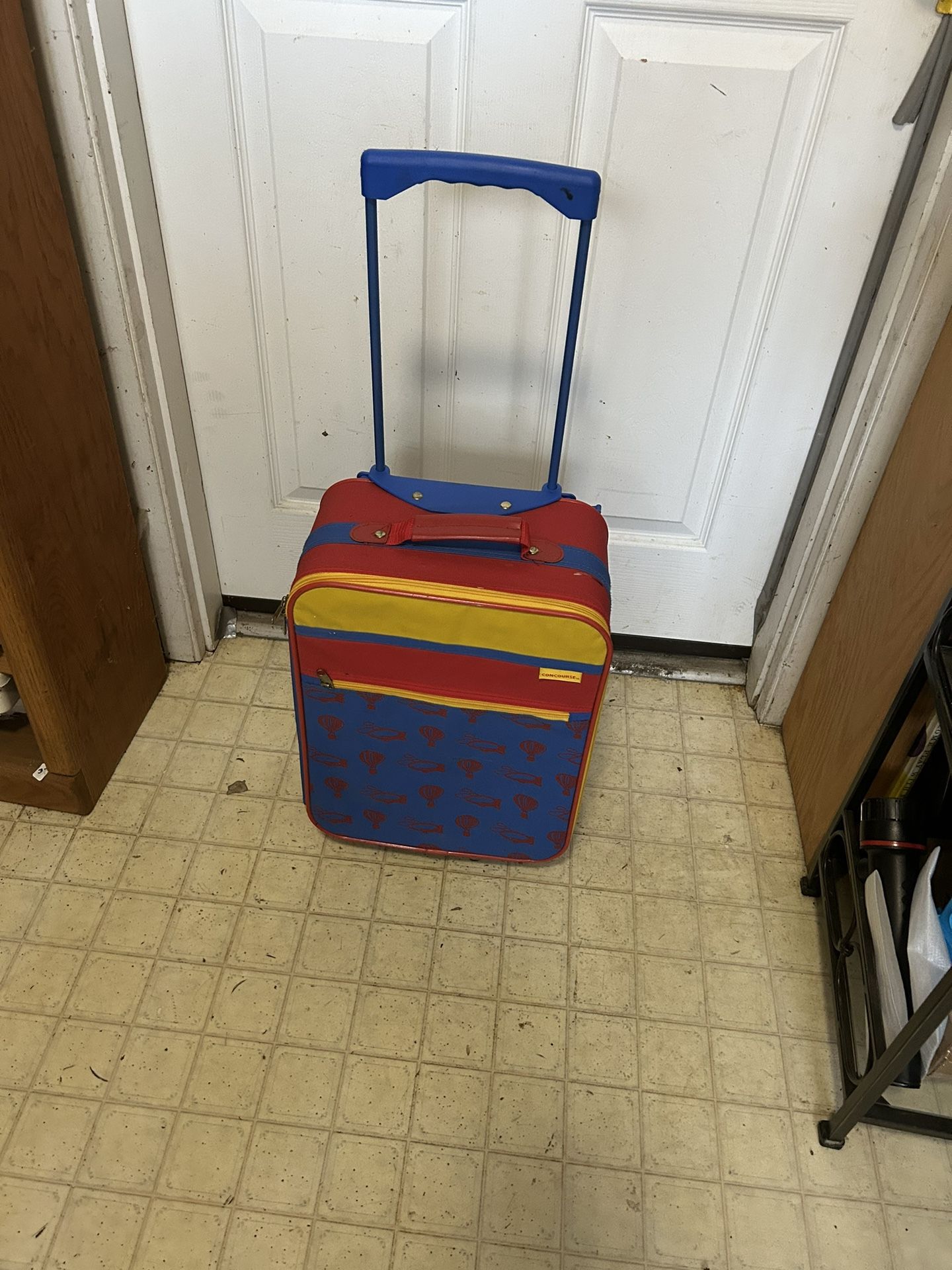 Child’s Luggage On Wheels