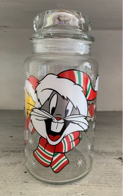 Vintage Looney Tunes Christmas seal tight glass jar. Marked 1994 Warner bros.  8 1/2” tall . Colors are bright and shiny
