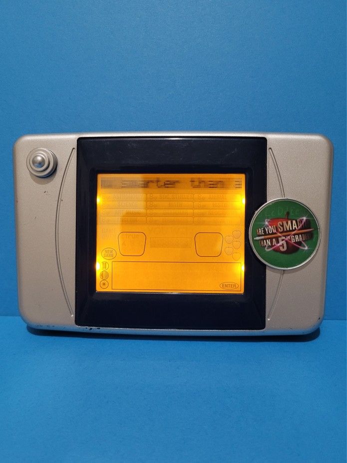 "Are You Smarter Than A 5th Grader?" handheld electronic touch screen Game