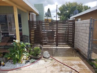 iron and wood gates and fences
