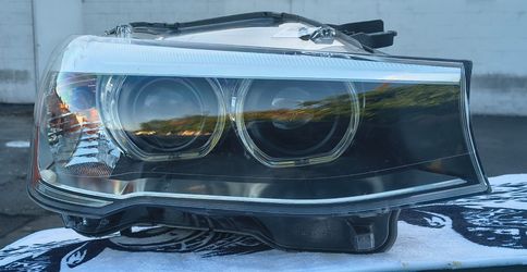 BMW X3 PASSANGER SIDE HEADLIGHT