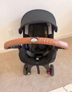 Doona Exp 2030 carseat/stroller + Base