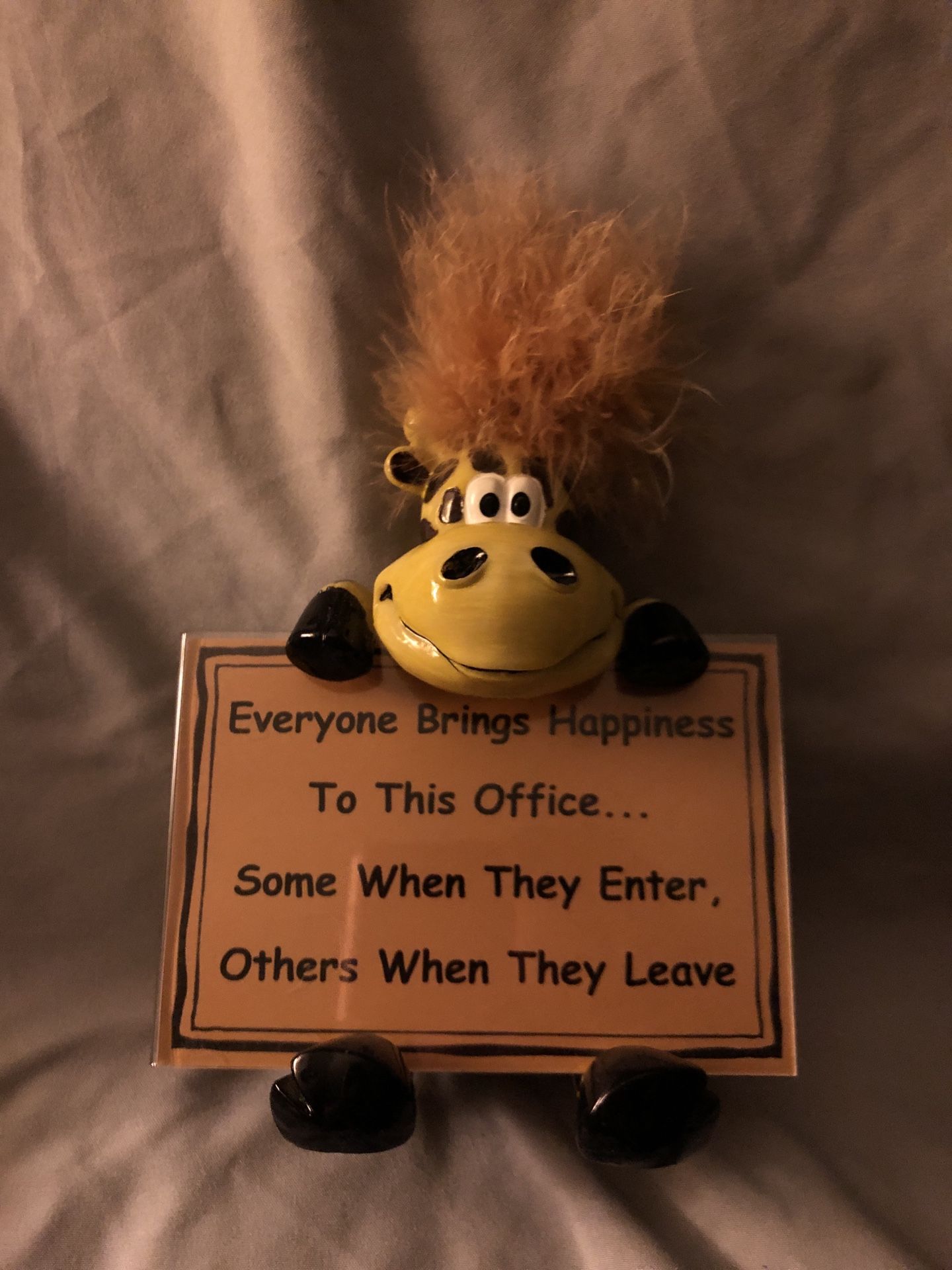 Humorous Giraffe Holding Office Sign