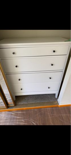 White 4-Drawer Dresser with Black Knobs