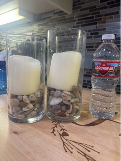 candle holder with candle and rocks