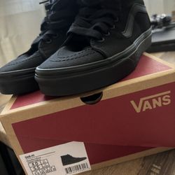 Black Hi-top Vans 