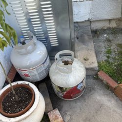 One  empty propane tank 15 lbs