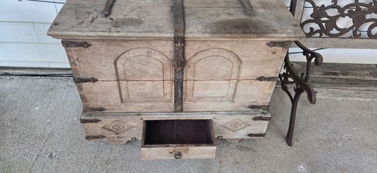 Antique baroque style domed aok trunk with iron accents and ornate lock