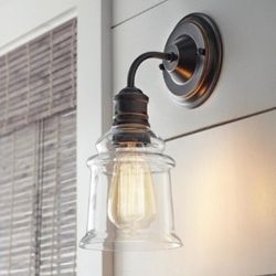 1-Light Antique Bronze Wall Sconce with Clear Glass Shade

