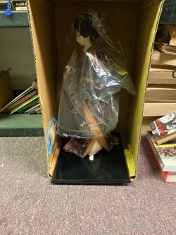 Asian doll figurine
