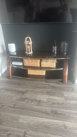 TV stand with black glass and wood