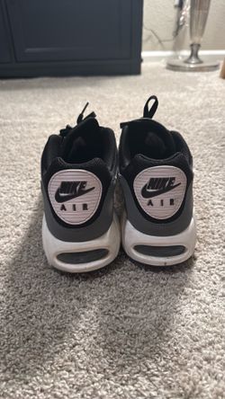 Black Nike correlate sneakers