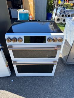 Cafe 30 Inch Wide 7 Cu. Ft. Slide In Double Oven Induction Range with Convection Matte White / Brushed Bronze Alternate Image Alternate Image Alternat